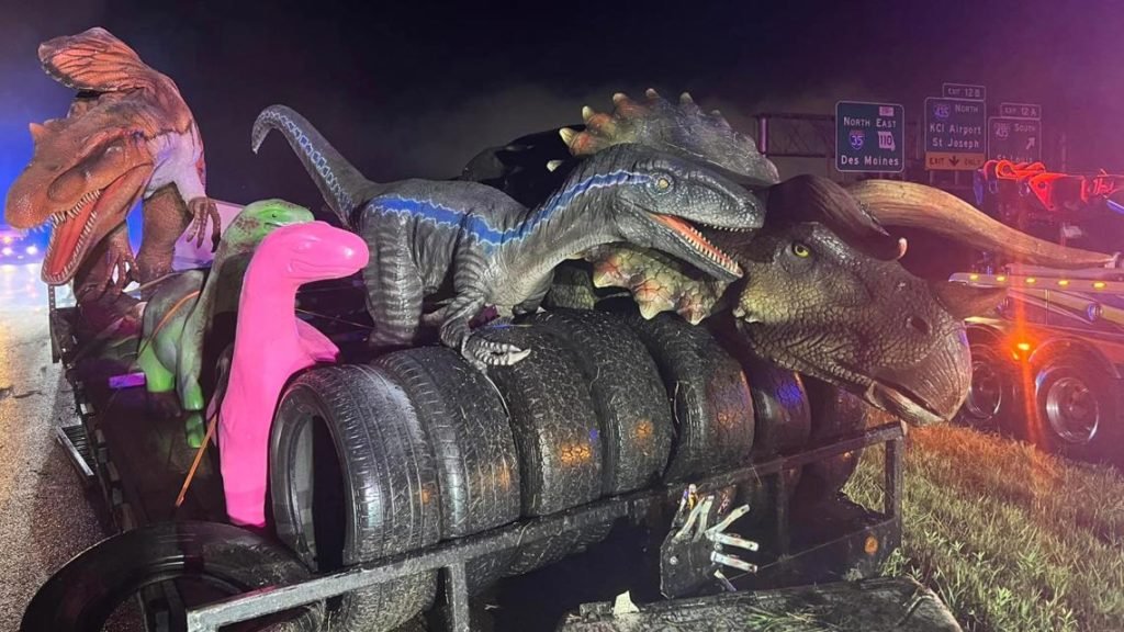 Trailer towing dinosaur statues slides off Missouri highway - WTHR